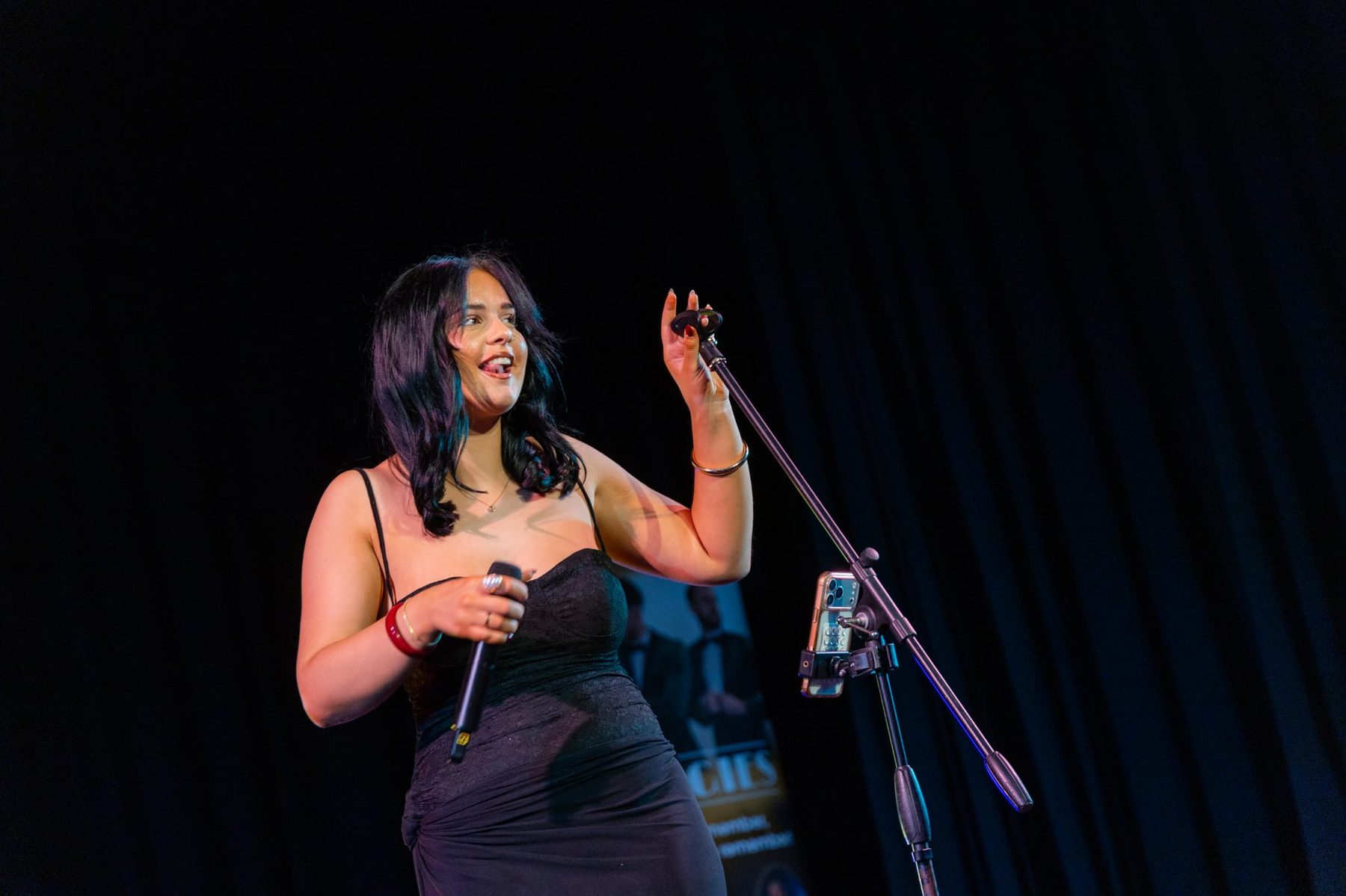Molly Imogen singing on stage